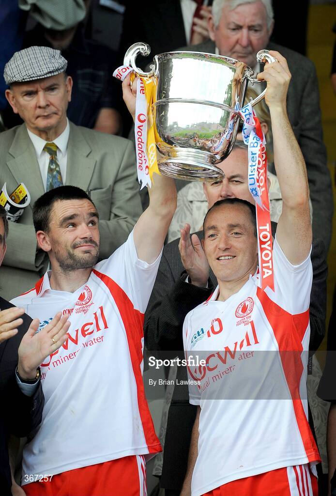 19 July 2009; Tyrone captain Brian Dooher, left, and team-mate Ryan McMenamin lift the cup. GAA Football Ulster Senior Championship Final, Tyrone v Antrim, St Tighearnach's Park, Clones, Co. Monaghan. Picture credit: Brian Lawless / SPORTSFILE