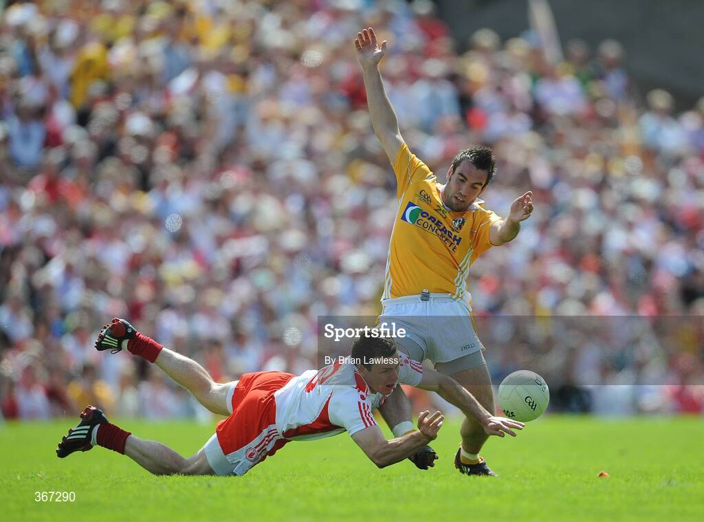 19 July 2009; Kevin Hughes, Tyrone, in action against Kevin Niblock, Antrim. GAA Football Ulster Senior Championship Final, Tyrone v Antrim, St Tighearnach's Park, Clones, Co. Monaghan. Picture credit: Brian Lawless / SPORTSFILE