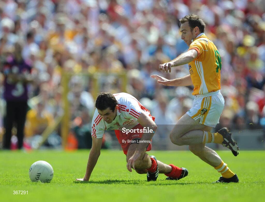 19 July 2009; Justin McMahon, Tyrone, in action against Ciaran Close, Antrim. GAA Football Ulster Senior Championship Final, Tyrone v Antrim, St Tighearnach's Park, Clones, Co. Monaghan. Picture credit: Brian Lawless / SPORTSFILE