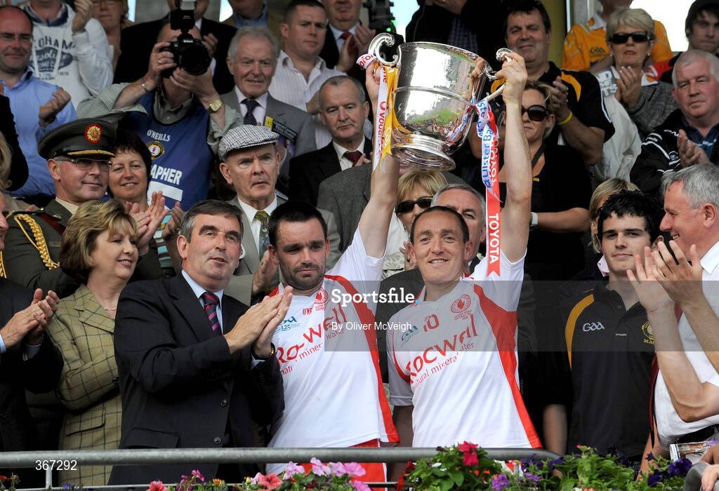 19 July 2009; Tyrone captain Brian Dooher, right, and team-mate Ryan McMenamin  lift the Anglo Celt cup. GAA Football Ulster Senior Championship Final, Tyrone v Antrim, St Tighearnach's Park, Clones, Co. Monaghan. Picture credit: Oliver McVeigh / SPORTSFILE