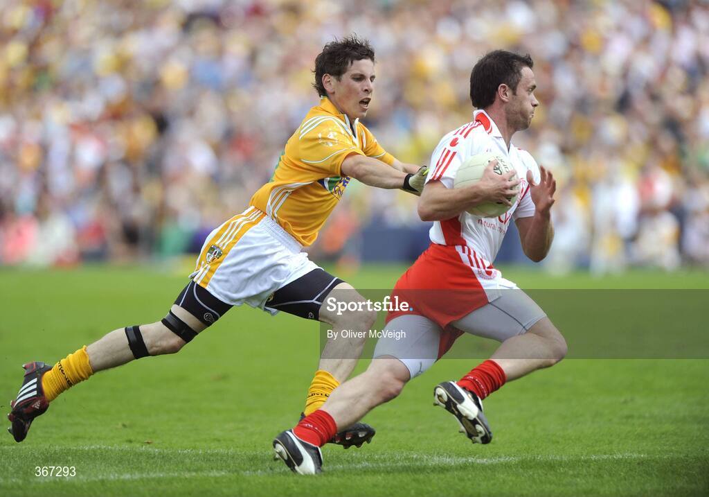 19 July 2009; Martin Penrose, Tyrone, in action against Kevin O'Boyle, Antrim. GAA Football Ulster Senior Championship Final, Tyrone v Antrim, St Tighearnach's Park, Clones, Co. Monaghan. Picture credit: Oliver McVeigh / SPORTSFILE