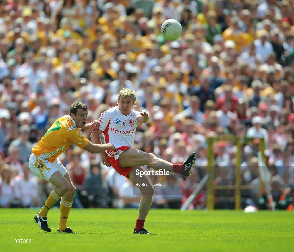 19 July 2009; Owen Mulligan, Tyrone, in action against James Loughrey, Antrim. GAA Football Ulster Senior Championship Final, Tyrone v Antrim, St Tighearnach's Park, Clones, Co. Monaghan. Picture credit: Brian Lawless / SPORTSFILE