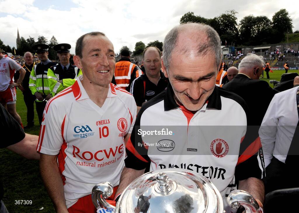19 July 2009; Tyrone manager, Mickey Harte, along with Captain, Brian Dooher, after the game. GAA Football Ulster Senior Championship Final, Tyrone v Antrim, St Tighearnach's Park, Clones, Co. Monaghan. Picture credit: Oliver McVeigh / SPORTSFILE