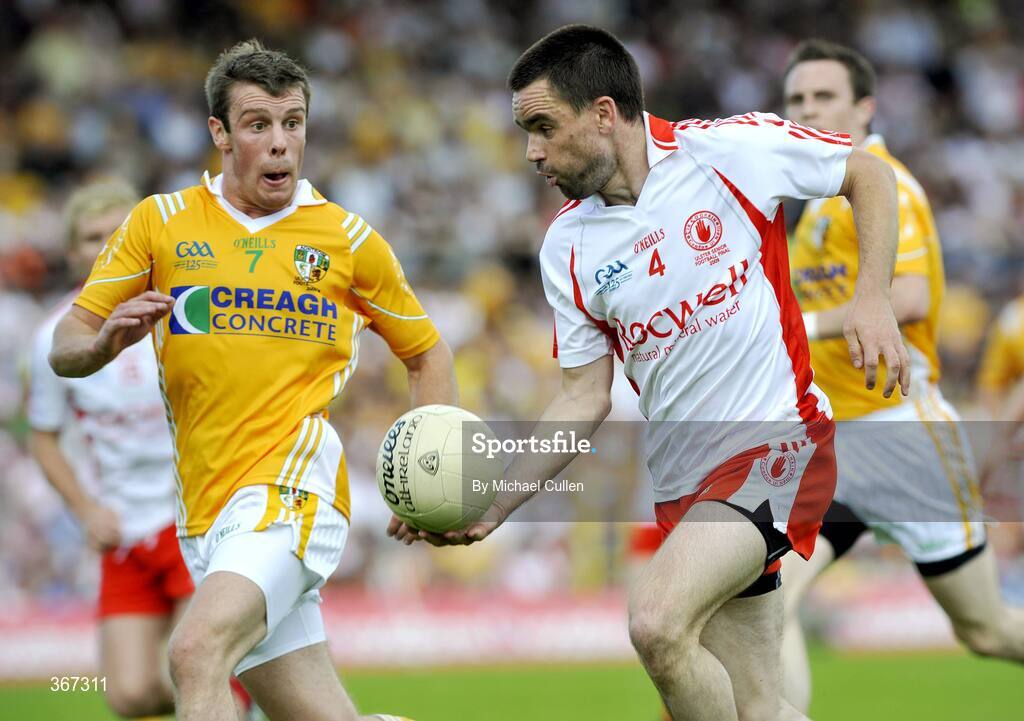 19 July 2009; Ryan McMenamin, Tyrone, in action against James Loughrey, Antrim. GAA Football Ulster Senior Championship Final, Tyrone v Antrim, St Tighearnach's Park, Clones, Co. Monaghan. Picture credit: Michael Cullen / SPORTSFILE
