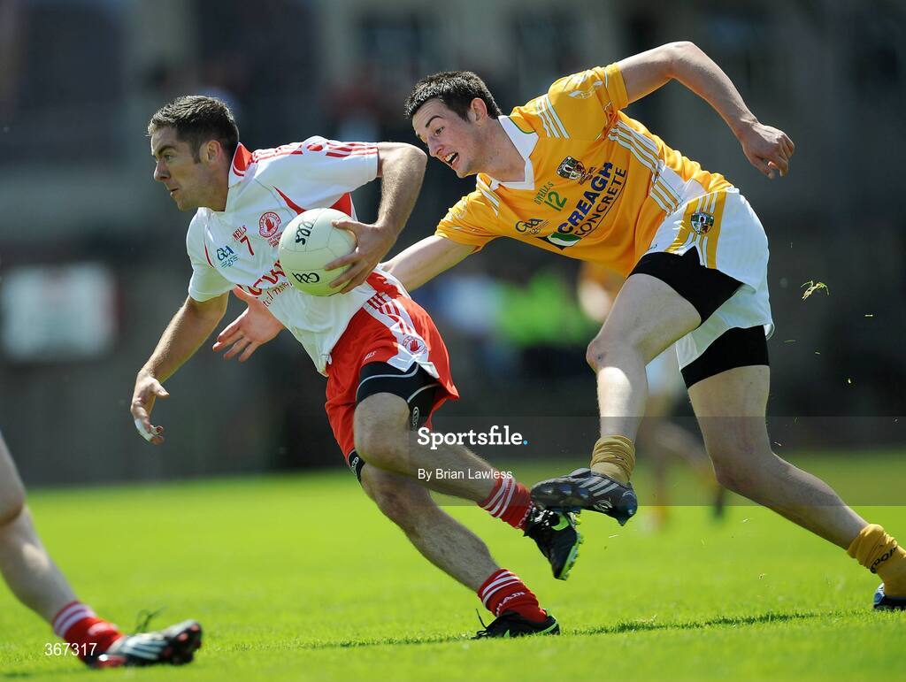 19 July 2009; Philip Jordan, Tyrone, in action against Niall McKeever, Antrim. GAA Football Ulster Senior Championship Final, Tyrone v Antrim, St Tighearnach's Park, Clones, Co. Monaghan. Picture credit: Brian Lawless / SPORTSFILE