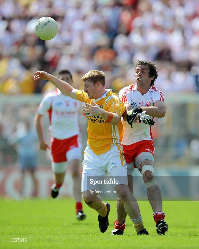 19 July 2009; Terry O'Neill, Antrim, in action against Joe McMahon, Tyrone. GAA Football Ulster Senior Championship Final, Tyrone v Antrim, St Tighearnach's Park, Clones, Co. Monaghan. Picture credit: Brian Lawless / SPORTSFILE