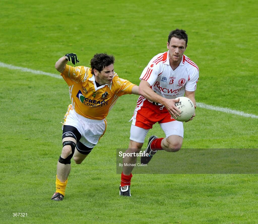19 July 2009; Martin Penrose, Tyrone, in action against Kevin O'Boyle, Antrim. GAA Football Ulster Senior Championship Final, Tyrone v Antrim, St Tighearnach's Park, Clones, Co. Monaghan. Picture credit: Michael Cullen / SPORTSFILE