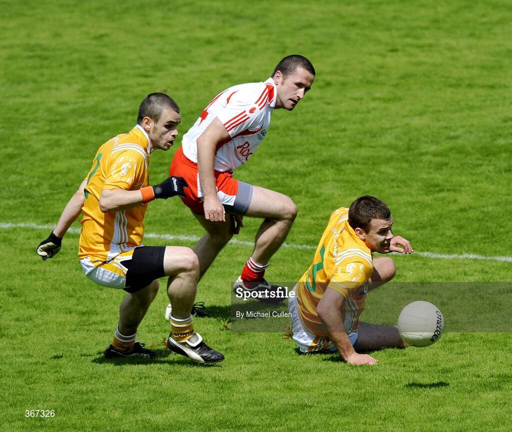 19 July 2009; Stephen O'Neill, Tyrone, in action against Colm Brady, left, Andy McClean, Antrim. GAA Football Ulster Senior Championship Final, Tyrone v Antrim, St Tighearnach's Park, Clones, Co. Monaghan. Picture credit: Michael Cullen / SPORTSFILE