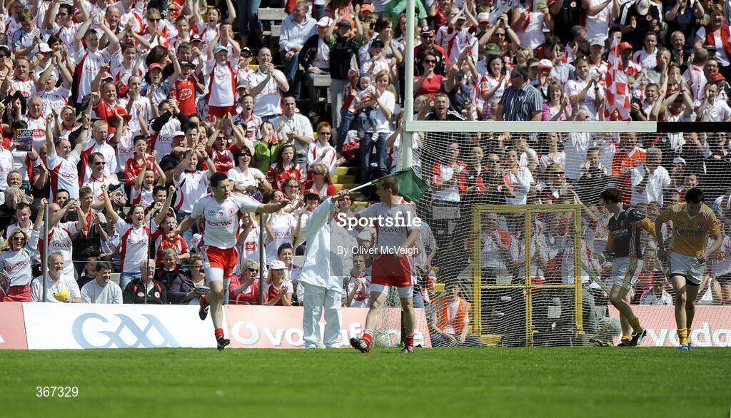 19 July 2009; Sean Cavanagh, Tyrone, left, celebrates with Tommy McGuigan, after scoring the first goal. GAA Football Ulster Senior Championship Final, Tyrone v Antrim, St Tighearnach's Park, Clones, Co. Monaghan. Picture credit: Oliver McVeigh / SPORTSFILE