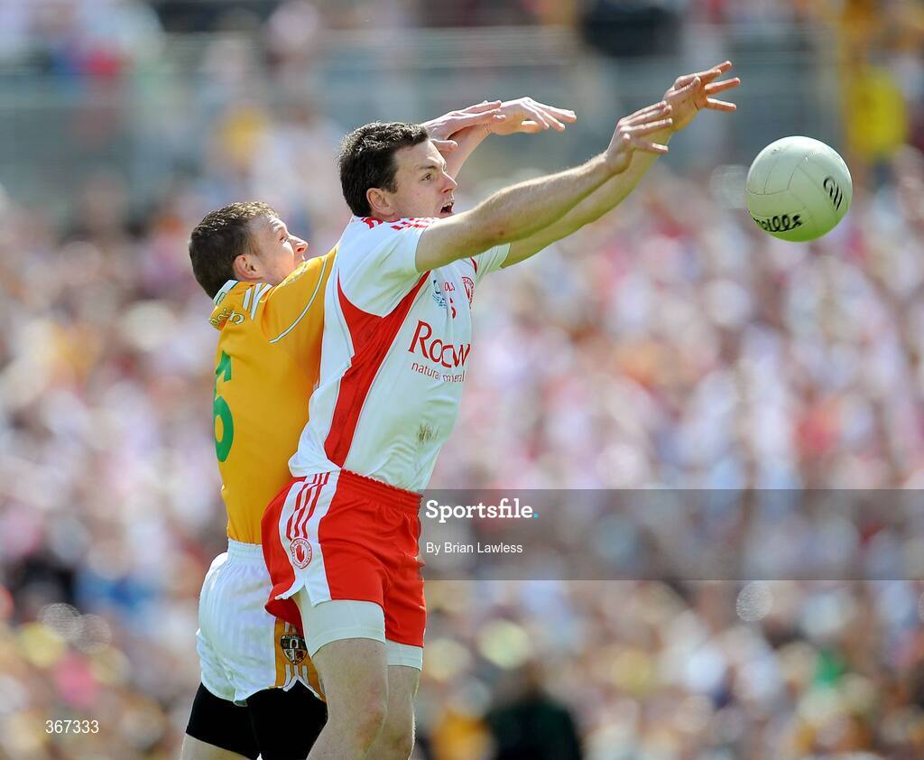 19 July 2009; Conor Gormley, Tyrone, in action against Justin Crozier, Antrim. GAA Football Ulster Senior Championship Final, Tyrone v Antrim, St Tighearnach's Park, Clones, Co. Monaghan. Picture credit: Brian Lawless / SPORTSFILE