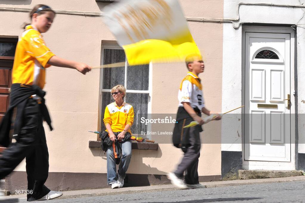19 July 2009; Antrim fan Bridget Hamill watches fans make their way to the match. GAA Football Ulster Senior Championship Final, Tyrone v Antrim, St Tighearnach's Park, Clones, Co. Monaghan. Picture credit: Brian Lawless / SPORTSFILE