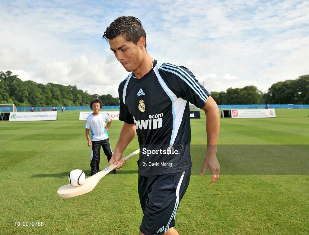 19 July 2009; Real Madrid's Cristiano Ronaldo practices his hurling skills during a special training session run by adidas and Lifestyle Sports. Real Madrid pre-season squad training, Carton House, Maynooth, Co. Kildare. Picture credit: David Maher / SPORTSFILE