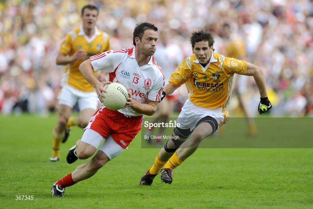 19 July 2009; Martin Penrose, Tyrone, in action against Kevin O'Boyle, Antrim. GAA Football Ulster Senior Championship Final, Tyrone v Antrim, St Tighearnach's Park, Clones, Co. Monaghan. Picture credit: Oliver McVeigh / SPORTSFILE