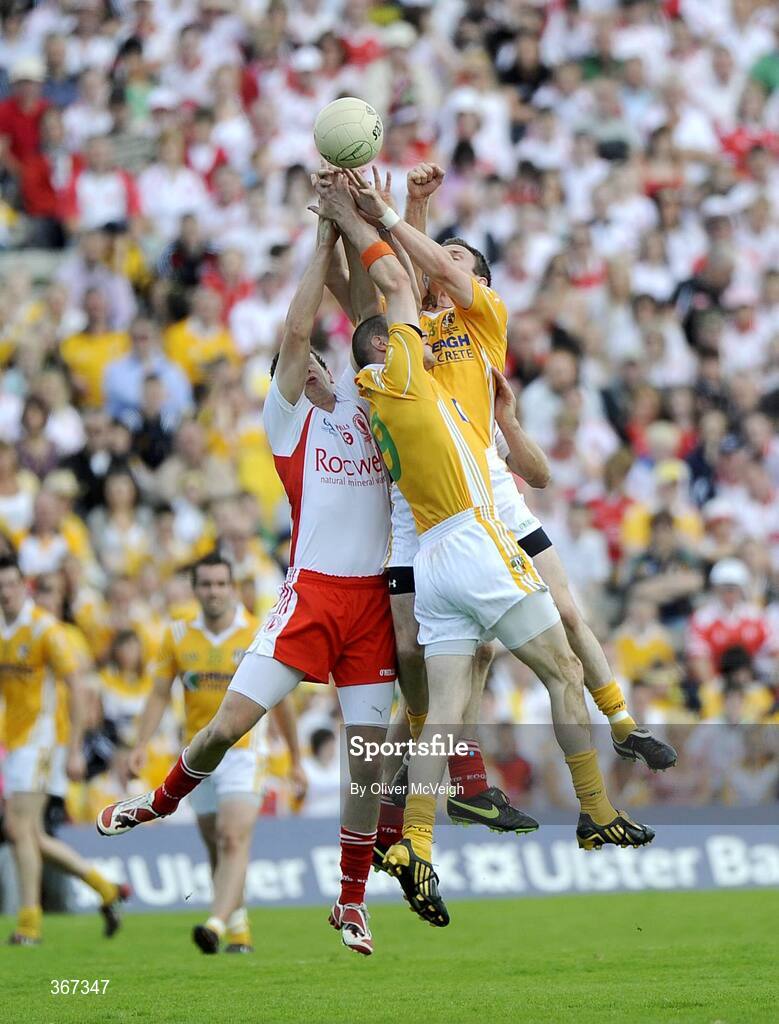 19 July 2009; Sean Cavanagh and Kevin Hughes, Tyrone, in action against Aodhan Gallagher and Michael McCann, Antrim. GAA Football Ulster Senior Championship Final, Tyrone v Antrim, St Tighearnach's Park, Clones, Co. Monaghan. Picture credit: Oliver McVeigh / SPORTSFILE