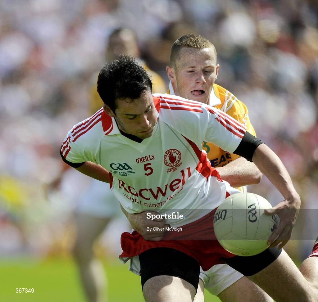 19 July 2009; Davy Harte, Tyrone, in action against Paddy Cunningham, Antrim. GAA Football Ulster Senior Championship Final, Tyrone v Antrim, St Tighearnach's Park, Clones, Co. Monaghan. Picture credit: Oliver McVeigh / SPORTSFILE
