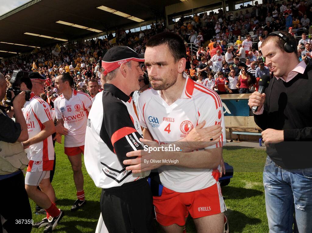 19 July 2009; Tyrone manager, Mickey Harte, and Ryan McMenamin, embrace at the final whistle. GAA Football Ulster Senior Championship Final, Tyrone v Antrim, St Tighearnach's Park, Clones, Co. Monaghan. Picture credit: Oliver McVeigh / SPORTSFILE