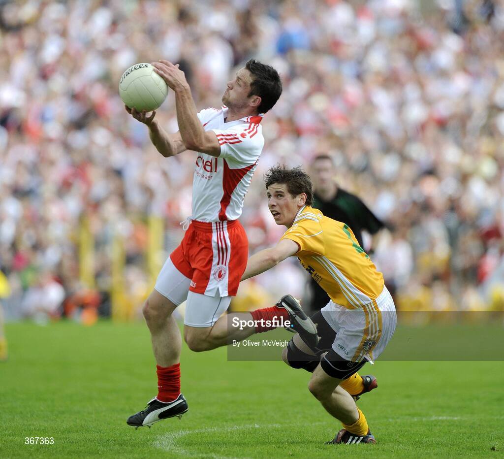 19 July 2009; Martin Penrose, Tyrone, in action against Kevin O'Boyle, Antrim. GAA Football Ulster Senior Championship Final, Tyrone v Antrim, St Tighearnach's Park, Clones, Co. Monaghan. Picture credit: Oliver McVeigh / SPORTSFILE