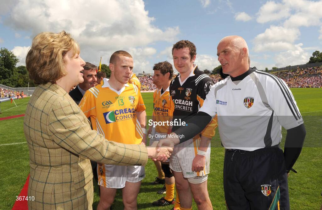 19 July 2009; President Mary McAleese shakes ands with Antrim manager Liam Bradley before the game. GAA Football Ulster Senior Championship Final, Tyrone v Antrim, St Tighearnach's Park, Clones, Co. Monaghan. Picture credit: Oliver McVeigh / SPORTSFILE