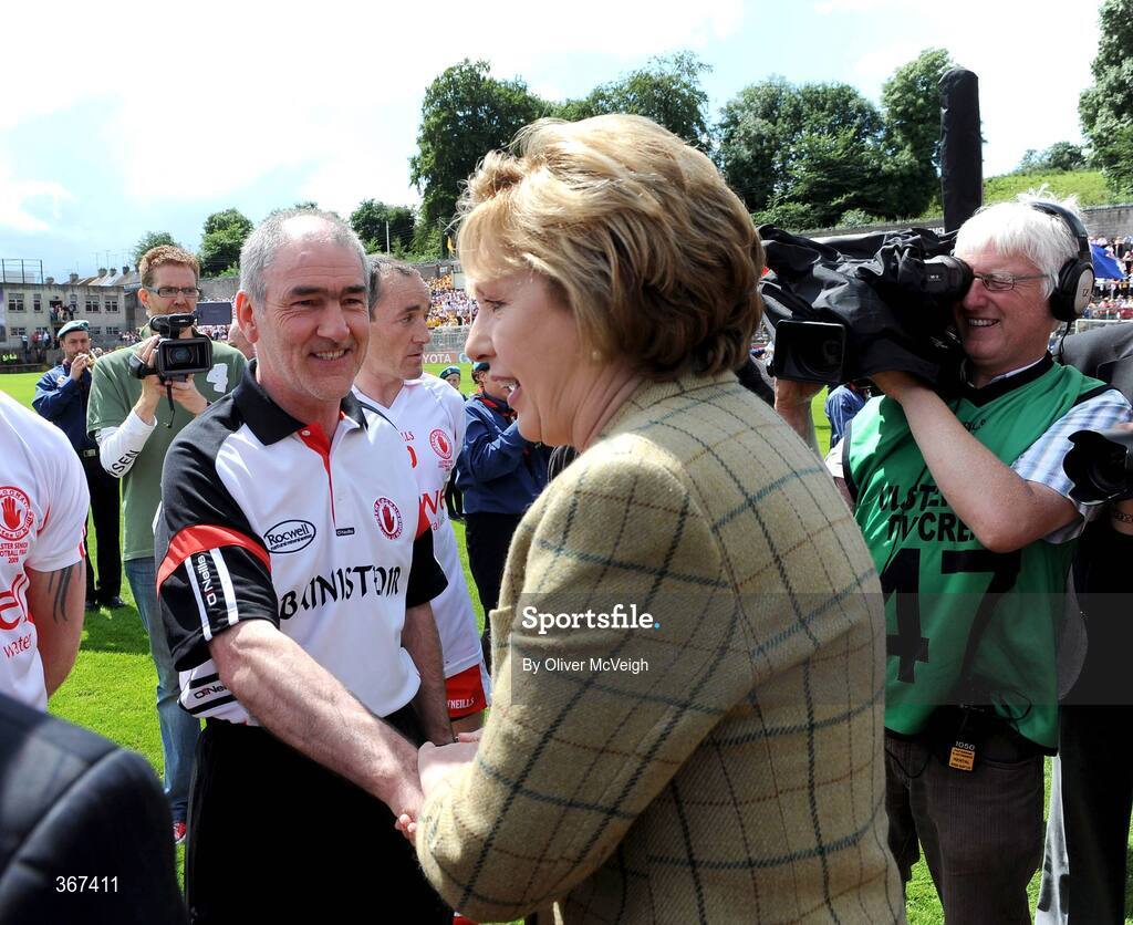 19 July 2009; President Mary McAleese shakes hands with Tyrone manager Mickey Harte before the game. GAA Football Ulster Senior Championship Final, Tyrone v Antrim, St Tighearnach's Park, Clones, Co. Monaghan. Picture credit: Oliver McVeigh / SPORTSFILE