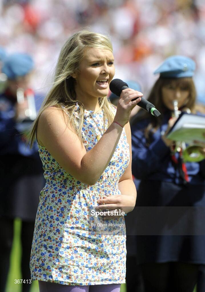19 July 2009; Megan Burns, Senior Scor Champion, from Armagh, and daughter of Jarleth Burns, sings Amhran na bhFiann before the game. GAA Football Ulster Senior Championship Final, Tyrone v Antrim, St Tighearnach's Park, Clones, Co. Monaghan. Picture credit: Oliver McVeigh / SPORTSFILE