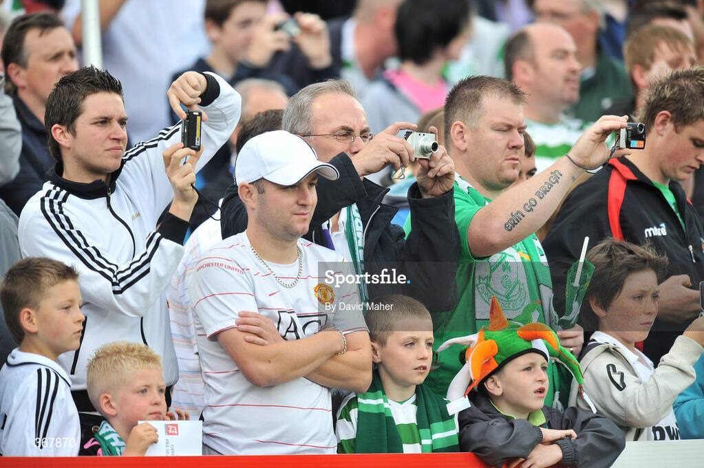 20 July 2009; Spectators take pictures as the Real Madrid team warm up before the start of the game. Soccer Friendly, Shamrock Rovers v Real Madrid, Tallaght Stadium, Dublin. Picture credit: David Maher / SPORTSFILE