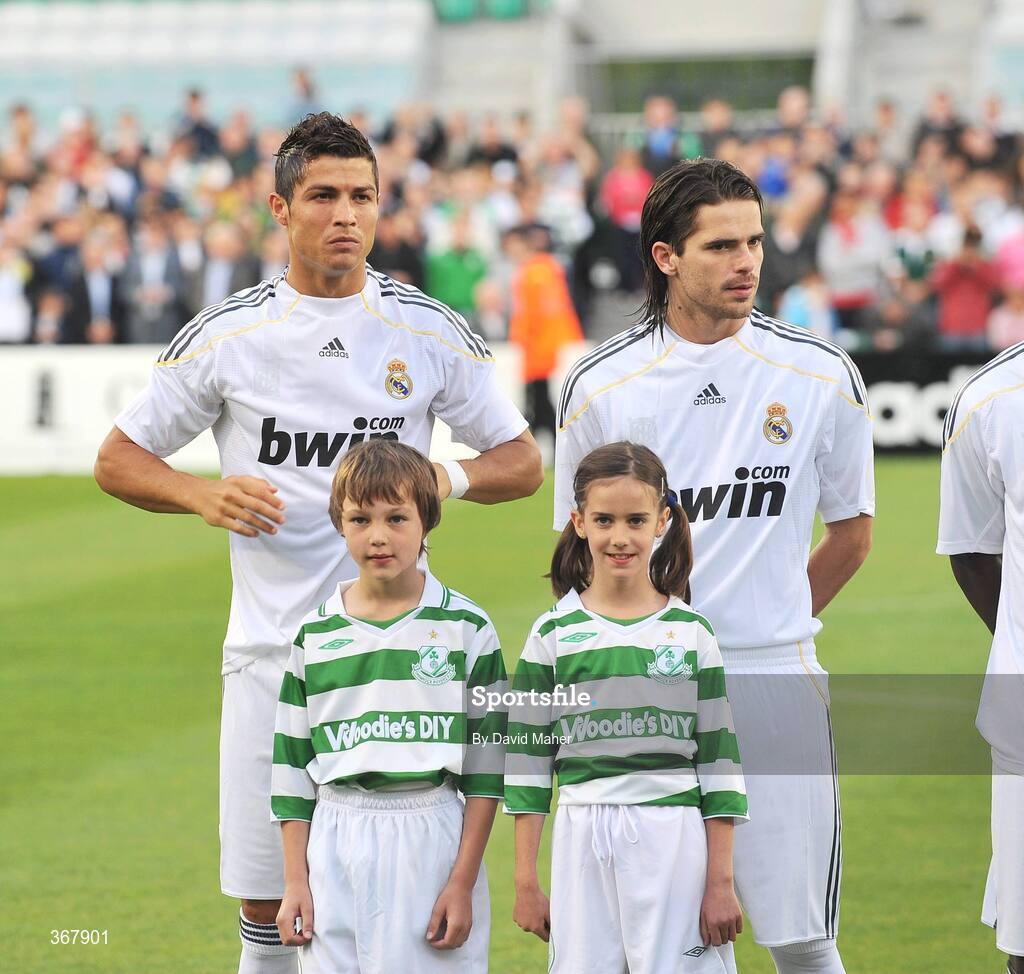 20 July 2009; Cristiano Ronaldo, left, and team-mate Fernando Gago, Real Madrid, with matchday mascots before the game. Soccer Friendly, Shamrock Rovers v Real Madrid, Tallaght Stadium, Dublin. Picture credit: David Maher / SPORTSFILE