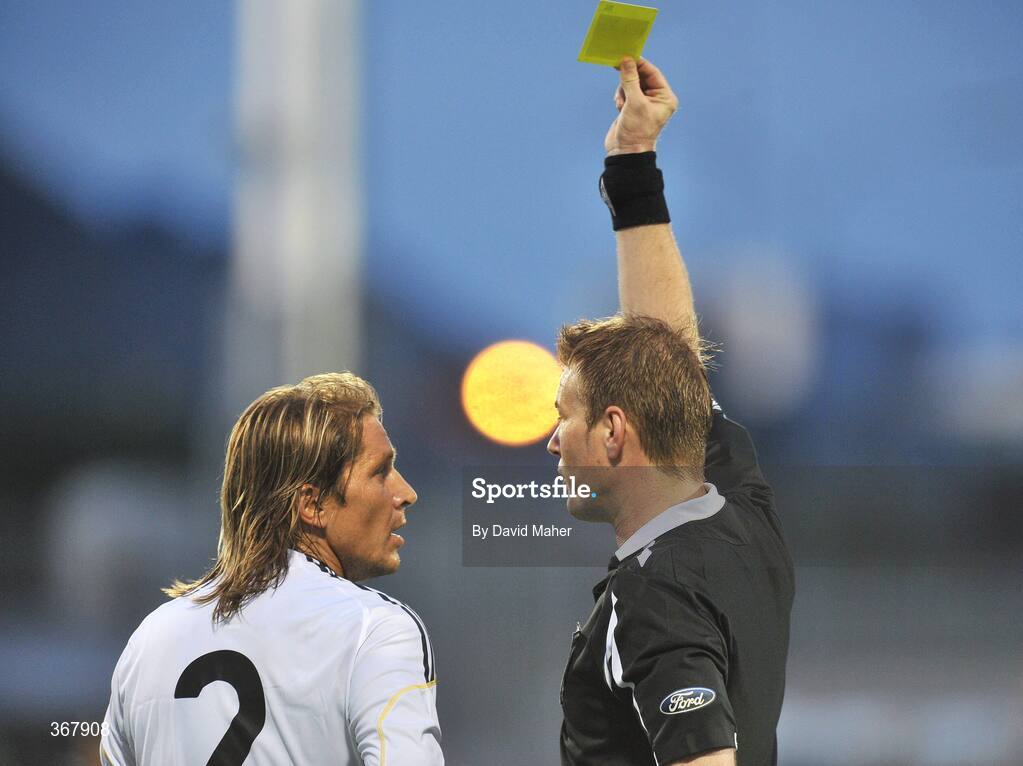 20 July 2009; Referee Alan Kelly shows a yellow card to Miguel Salgado, Real Madrid. Soccer Friendly, Shamrock Rovers v Real Madrid, Tallaght Stadium, Dublin. Picture credit: David Maher / SPORTSFILE