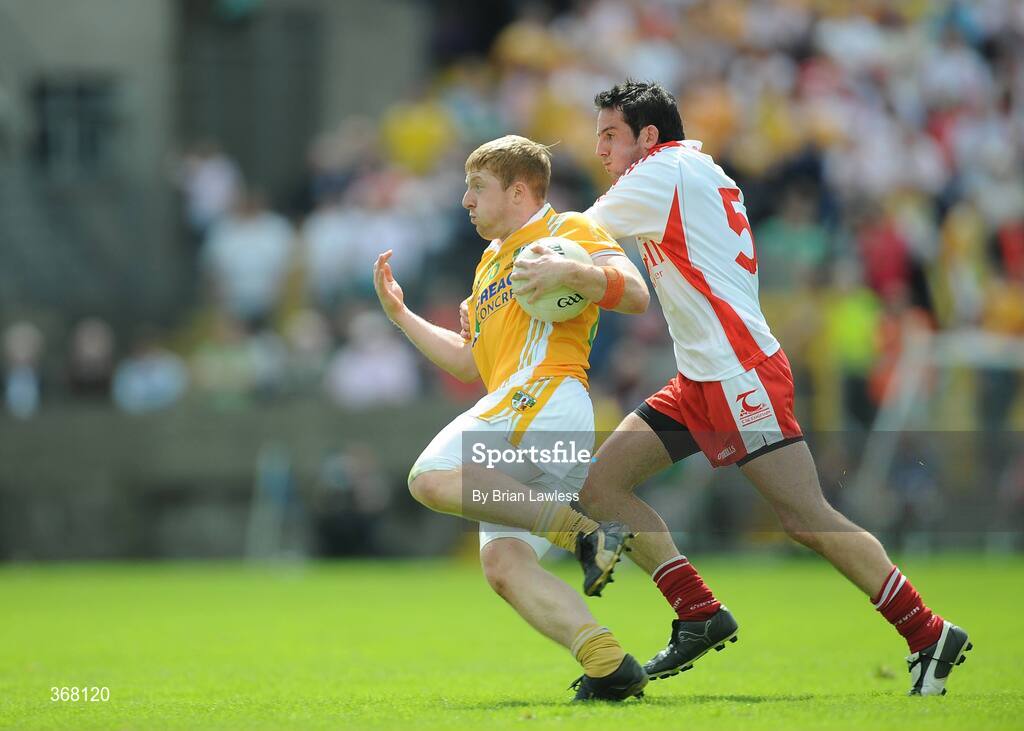 19 July 2009; Terry O'Neill, Antrim, in action against Davy Harte, Tyrone. GAA Football Ulster Senior Championship Final, Tyrone v Antrim, St Tighearnach's Park, Clones, Co. Monaghan. Picture credit: Brian Lawless / SPORTSFILE