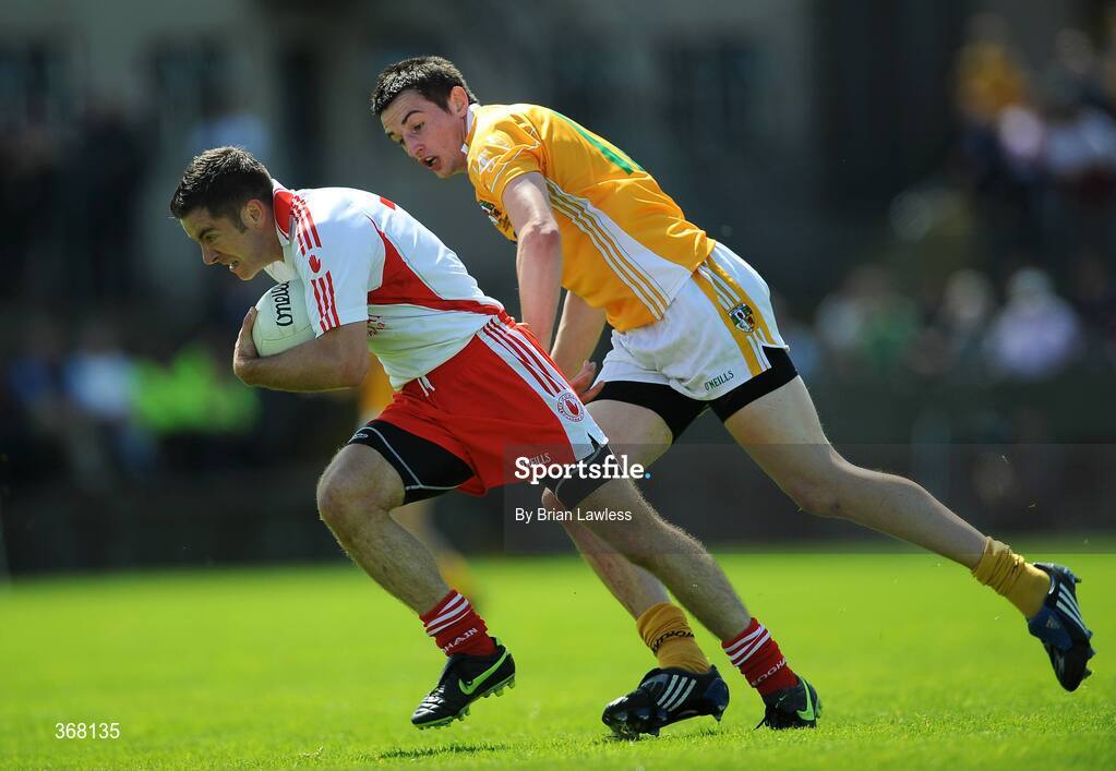 19 July 2009; Philip Jordan, Tyrone, in action against Niall McKeever, Antrim. GAA Football Ulster Senior Championship Final, Tyrone v Antrim, St Tighearnach's Park, Clones, Co. Monaghan. Picture credit: Brian Lawless / SPORTSFILE