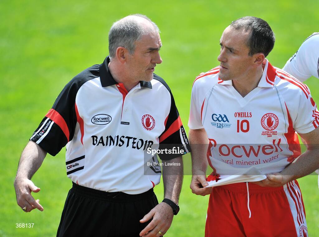 19 July 2009; Tyrone manager Mickey Harte in conversation with captain Brian Dooher before the match. GAA Football Ulster Senior Championship Final, Tyrone v Antrim, St Tighearnach's Park, Clones, Co. Monaghan. Picture credit: Brian Lawless / SPORTSFILE