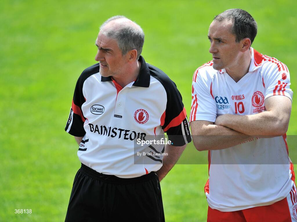 19 July 2009; Tyrone manager Mickey Harte with captain Brian Dooher before the match. GAA Football Ulster Senior Championship Final, Tyrone v Antrim, St Tighearnach's Park, Clones, Co. Monaghan. Picture credit: Brian Lawless / SPORTSFILE
