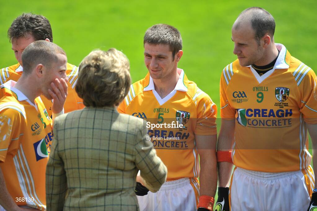 19 July 2009; Antrim captain Paddy Cunningham, left, introduces President Mary McAleese to team-mates Tony Scullion and Aodhan Gallagher, right. GAA Football Ulster Senior Championship Final, Tyrone v Antrim, St Tighearnach's Park, Clones, Co. Monaghan. Picture credit: Brian Lawless / SPORTSFILE
