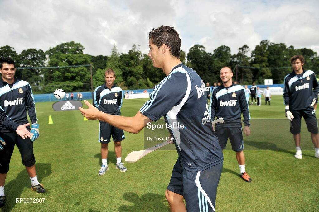 19 July 2009; Real Madrid's Cristiano Ronaldo practices his hurling skills with his team-mates during a special training session run by adidas and Lifestyle Sports. Real Madrid pre-season squad training, Carton House, Maynooth, Co. Kildare. Picture credit: David Maher / SPORTSFILE