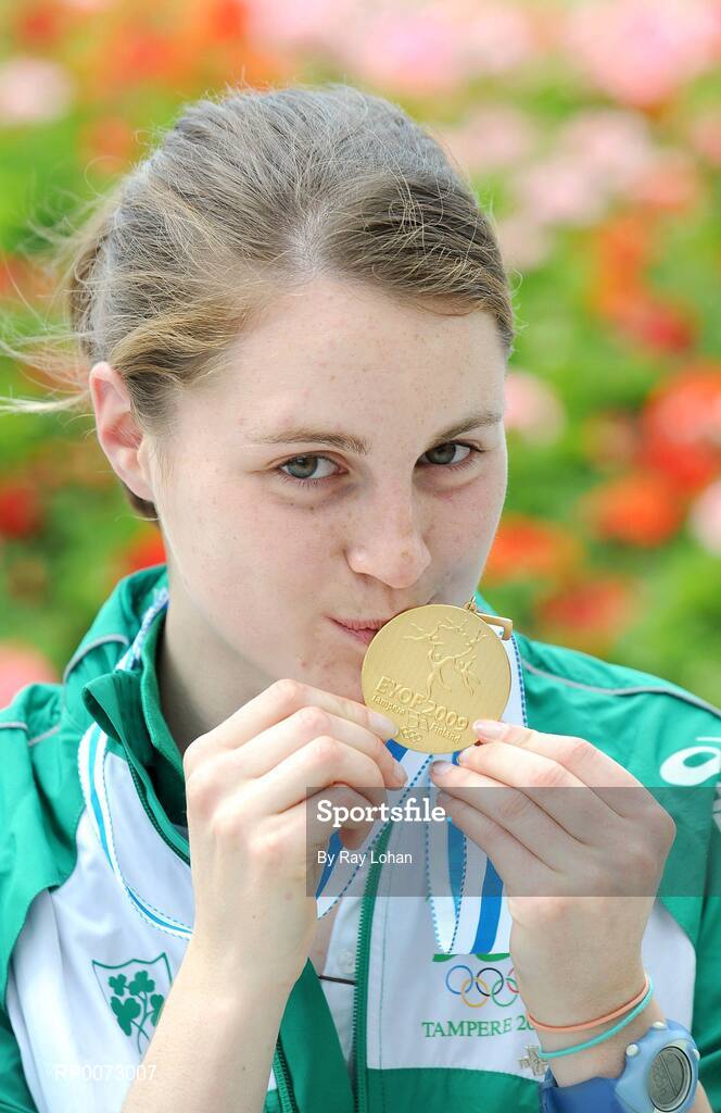 25 July 2009; Medal winning European Youth Olympic athlete Ciara Mageean, celebrates with her gold medal in the 1500m after her arrival at Dublin Airport, Dublin. Picture credit: Ray Lohan / SPORTSFILE