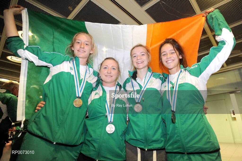 25 July 2009; Bronze medallist in the 400m relay at the European Youth Olympic, from left, Caoimhe King, Joan Healy, Joanne Mills and Christine McMahon at Dublin Airport, Dublin. Picture credit: Ray Lohan / SPORTSFILE