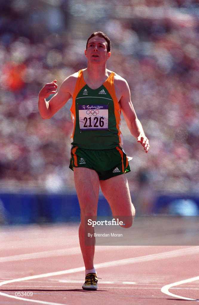 22 September 2000; Tomas Coman of Ireland crosses the finish line in his heat of the men's 400m at Stadium Australia in Sydney Olympic Park, Homebush Bay, Sydney, Australia.  Photo by Brendan Moran/Sportsfile