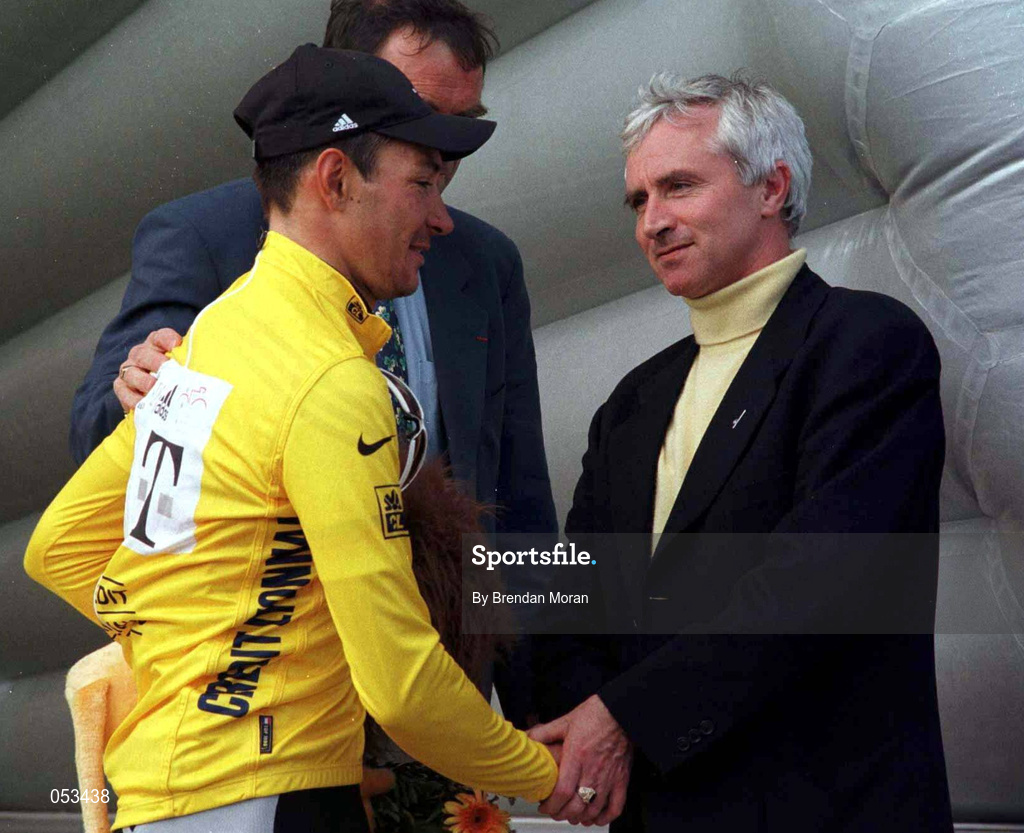 13 July 1998; Erik Zabel, holder of the yellow jersey is congratulated by Jim McDaid, Minister for Sport, Tourism and Recreation, following the stage two of the 1998 Tour de France from Enniscorthy to Cork. Photo by Brendan Moran/Sportsfile *POOL PICTURE*