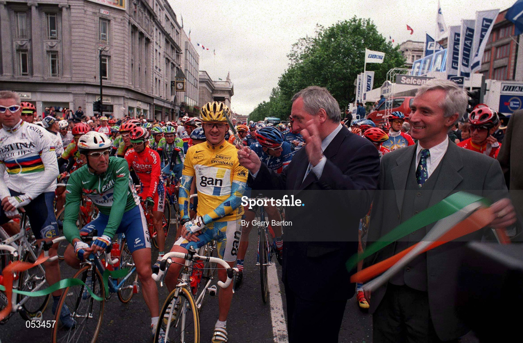 12 July 1998; An Taoiseach Bertie Ahern TD cuts the tape, alongside Jim McDaid, TD Minister for Sport, Tourism and Recreation, to officially start the 1998 Tour de France - Stage 1 on O'Connell Street in Dublin. Photo by Gerry Barton/Sportsfile