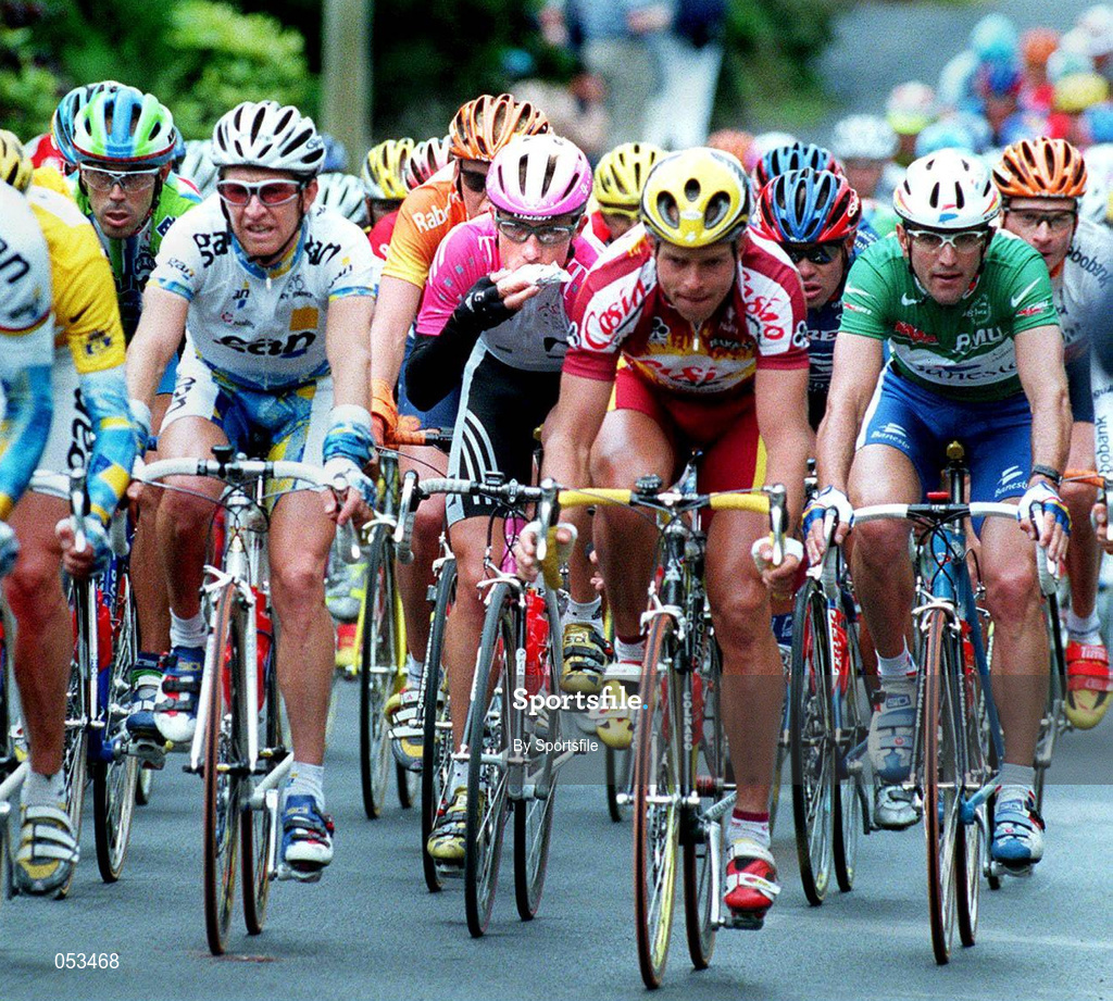 12 July 1998; A rider takes on some body fuel during the 1998 Tour De France - Stage 1 as the Peloton passes through Rathdrum in Wicklow. Photo by Pool via Sportsfile.