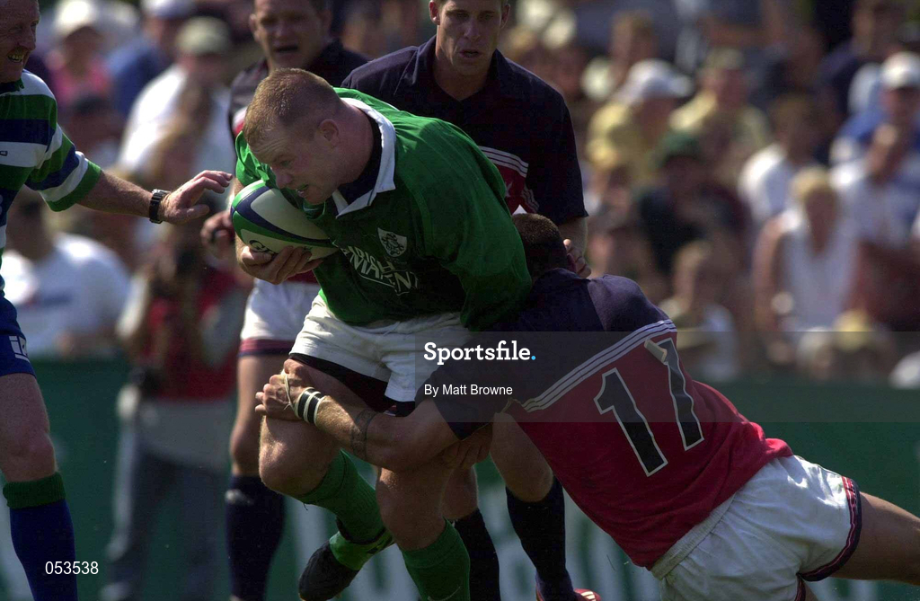 10 June 2000; Frank Sheahan of Ireland is tackled by Malakai Delai of USA during the Rugby International match between USA and Ireland at Singer Family Park in Manchester, New Hampshire, USA. Photo by Matt Browne/Sportsfile