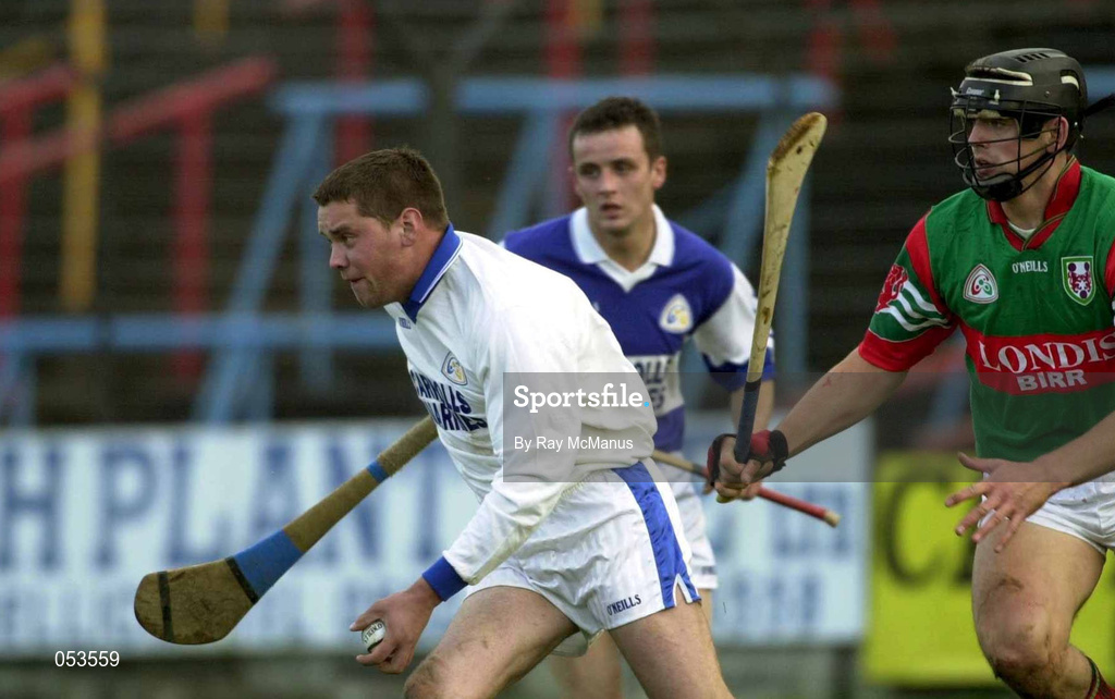 4 November 2000; John Lyons of Castletown runs clear of Gary Hanniffy of Birr during the AIB Leinster Club Hurling Championship Quarter-Final match between Castletown and Birr at O'Moore Park in Portlaoise, Laois. Photo by Ray McManus/Sportsfile