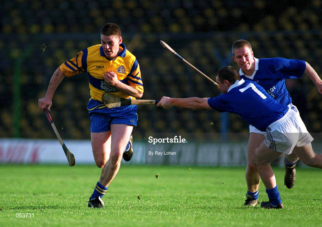 26 November 2000; John Reddan of Sixmilebridge in action against Keith O'Neill of Mount Sion during the AIB Munster Senior Hurling Club Championship Final match between Sixmilebridge and Mount Sion at Semple Stadium in Thurles, Tipperary. Photo by Ray Lohan/Sportsfile