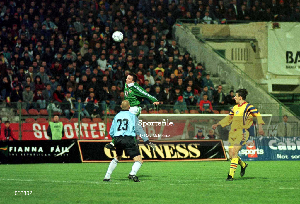 30 April 1997; David Connolly of Republic of Ireland heads the ball over the head of Romanian goalkeeper Bogdan Stelea during the FIFA World Cup 1998 Group 8 Qualifiying match between Romania and Republic of Ireland at Stadionul Steaua in Bucharest, Romania. Photo by Ray McManus/Sportsfile