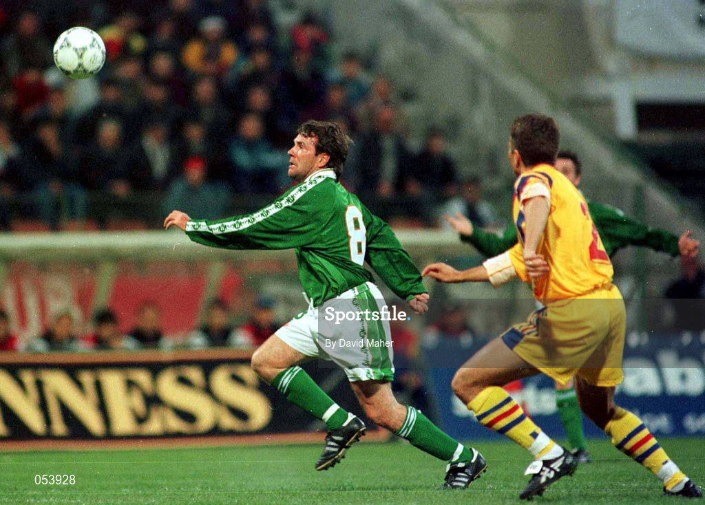 30 April 1997; Ray Houghton of Republic of Ireland attempts to get a shot away despite the attentions of Dan Petrescu of Romania during the FIFA World Cup 1998 Group 8 Qualifiying match between Romania and Republic of Ireland at Stadionul Steaua in Bucharest, Romania. Photo by David Maher/Sportsfile