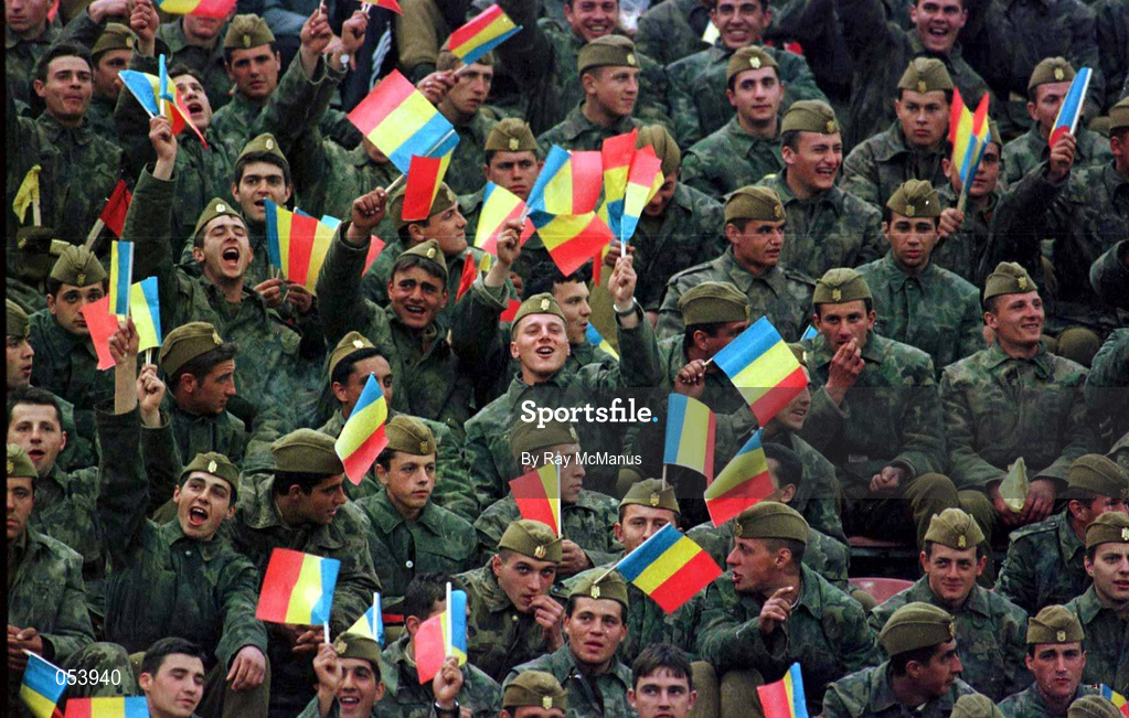 30 April 1997; Members of the Romanian Armed Forces cheer on their side during the FIFA World Cup 1998 Group 8 Qualifiying match between Romania and Republic of Ireland at Stadionul Steaua in Bucharest, Romania. Photo by Ray McManus/Sportsfile