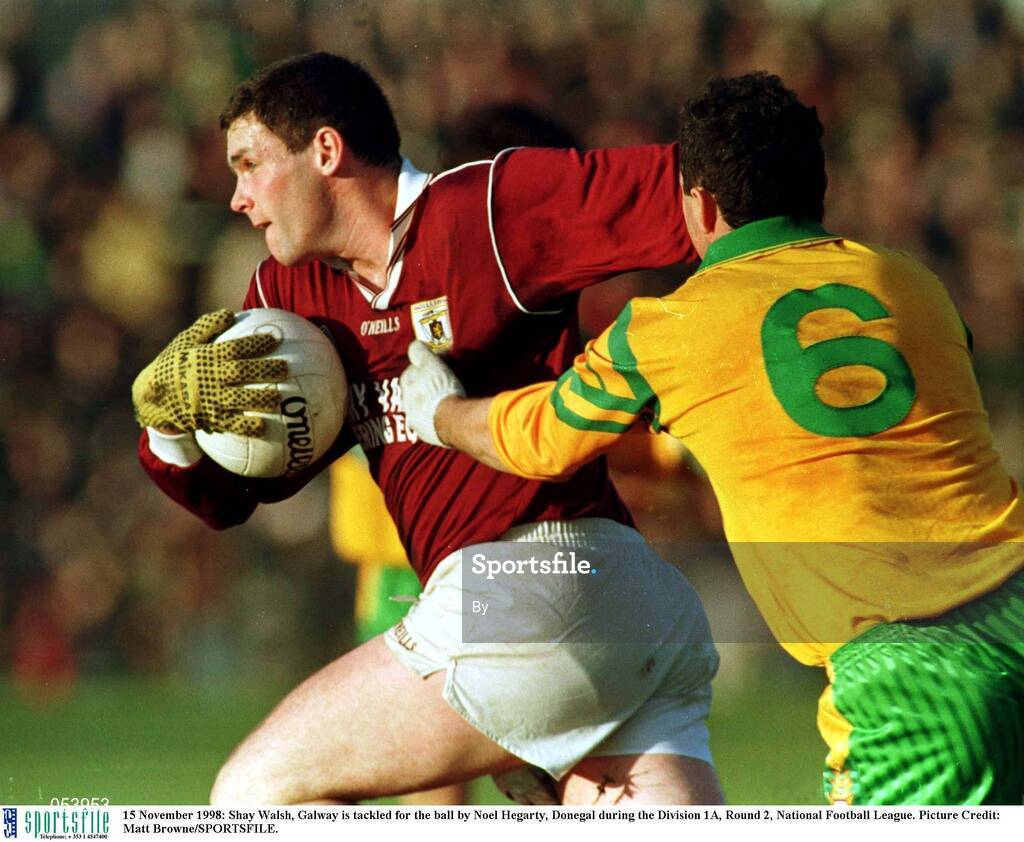 15 November 1998: Shay Walsh, Galway is tackled for the ball by Noel Hegarty, Donegal during the Division 1A, Round 2, National Football League. Picture Credit: Matt Browne/SPORTSFILE.