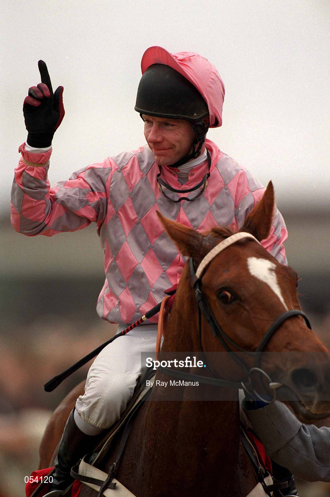 16 March 2000; Jockey Mick Fitzgerald celebrates after winning the Bonusprint Stayers' Hurdle on Bacchanal on Day Three of the Cheltenham Racing Festival at Prestbury Park in Cheltenham, England. Photo by Ray McManus/Sportsfile