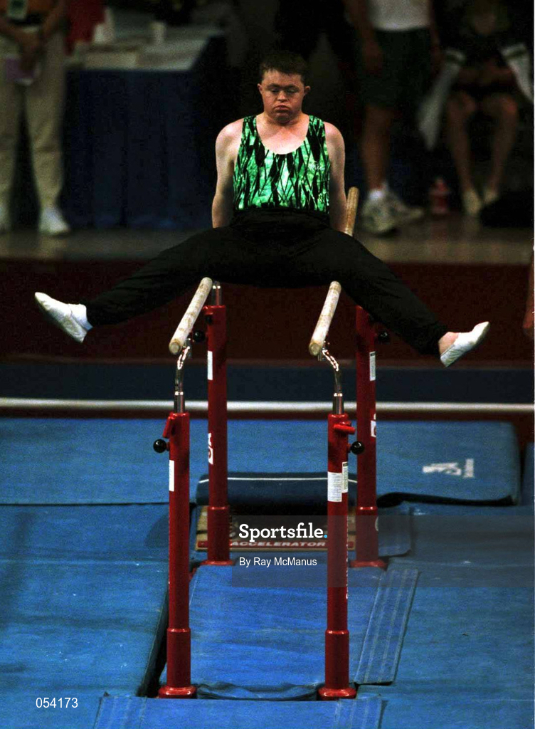 2 July 1999; Gymnast Adam Morrison from Newtownards, Down, competing in the parallel bars at 1999 Special Olympics World Summer Games in Raleigh, North Carolina, USA. Photo by Ray McManus/Sportsfile