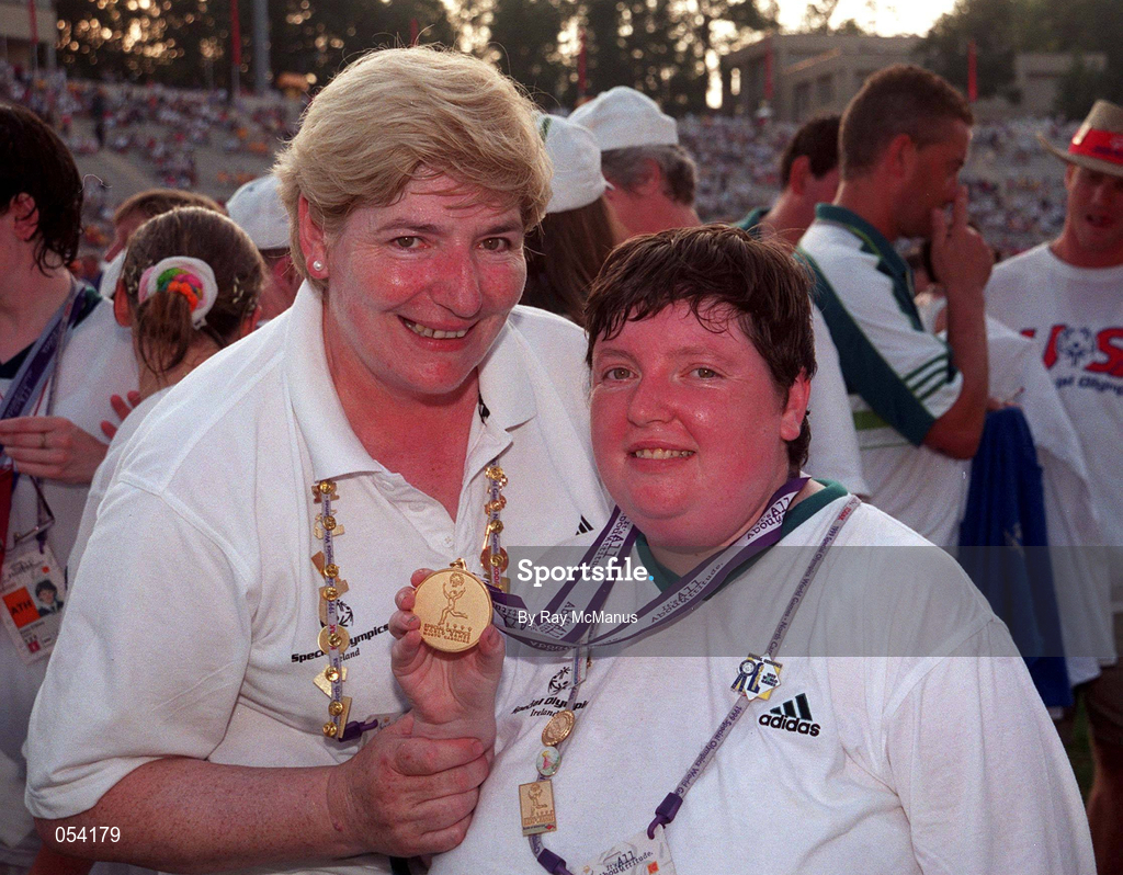 4 July 1999; Special Olympian Catherine Roche from Palatine, Carlow, who won a Gold medal in Table Tennis with Eileen Brophy, who acted as a chaperone to the Athletic team at the Closing Ceremony of the 1999 Special Olympics World Summer Games in Raleigh, North Carolina, USA. Photo by Ray McManus/Sportsfile