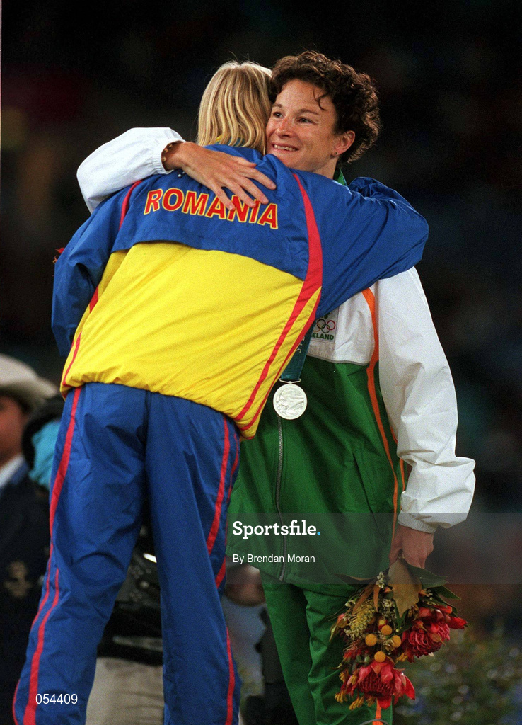 25 September 2000; Sonia O'Sullivan of Ireland congratulates gold medallist Gabriela Szabo of Romania during the medal ceremony after winning a silver medal in the Women's 5000m Final at Stadium Australia in Sydney Olympic Park, Homebush Bay, Sydney, Australia.  Photo by Brendan Moran/Sportsfile